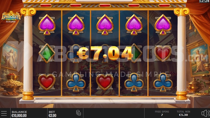 Winning combination of five spades in the top row during Free Spins.