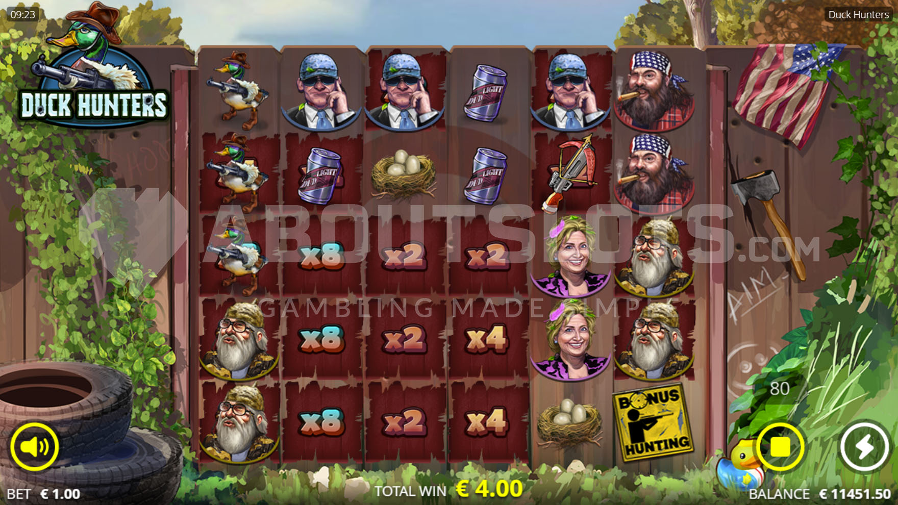 Base game view featuring a 6x5 grid on a wooden fence against a natural backdrop.