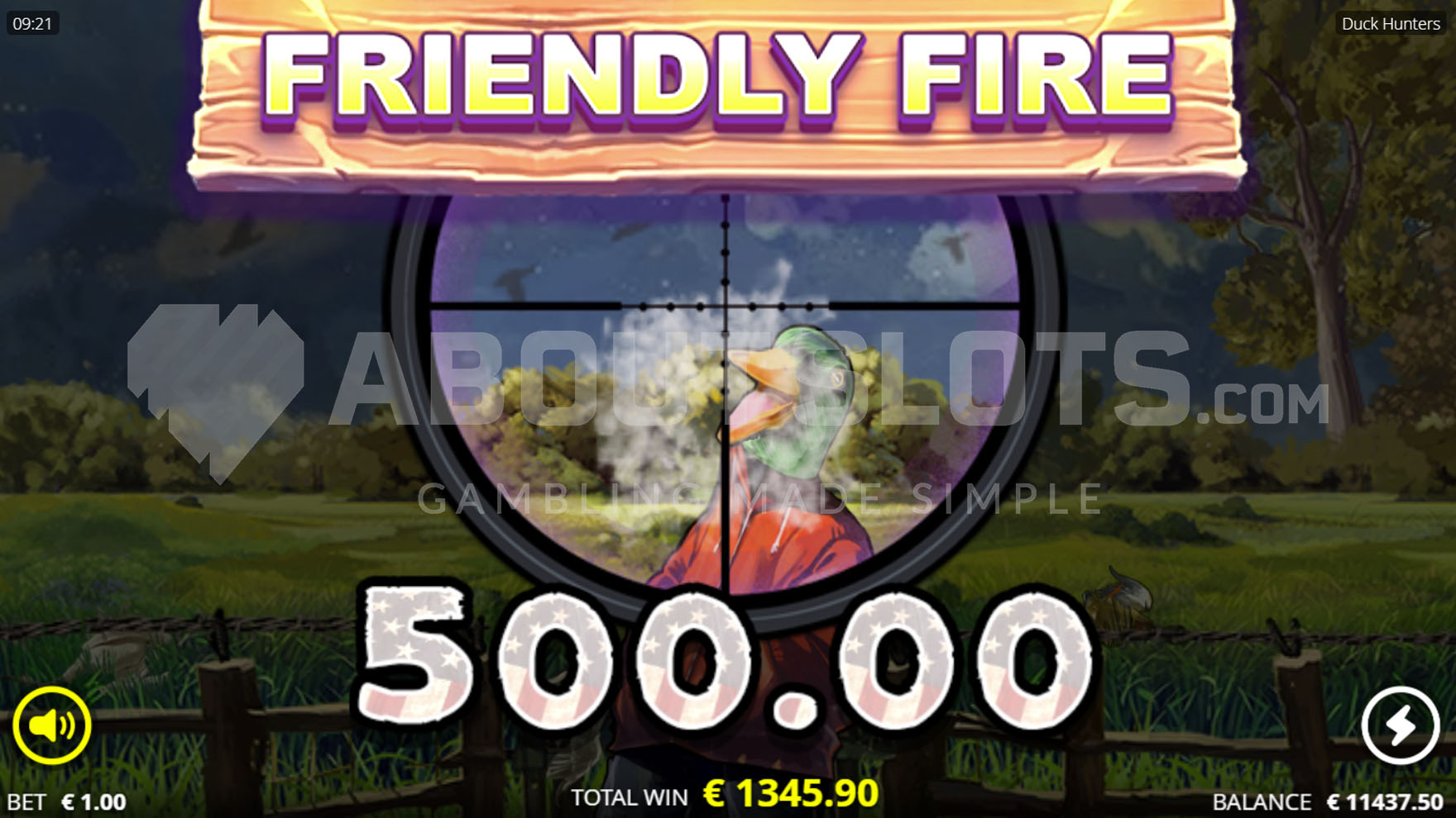 Large win celebration screen with a rifle scope aiming at a duck.