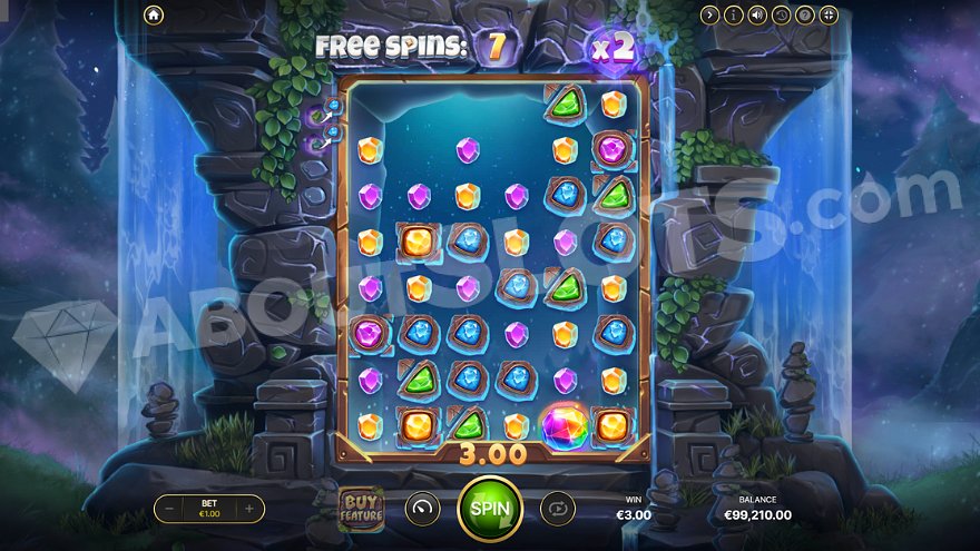 Empty spaces awaiting new symbols after a win during free spins mode.