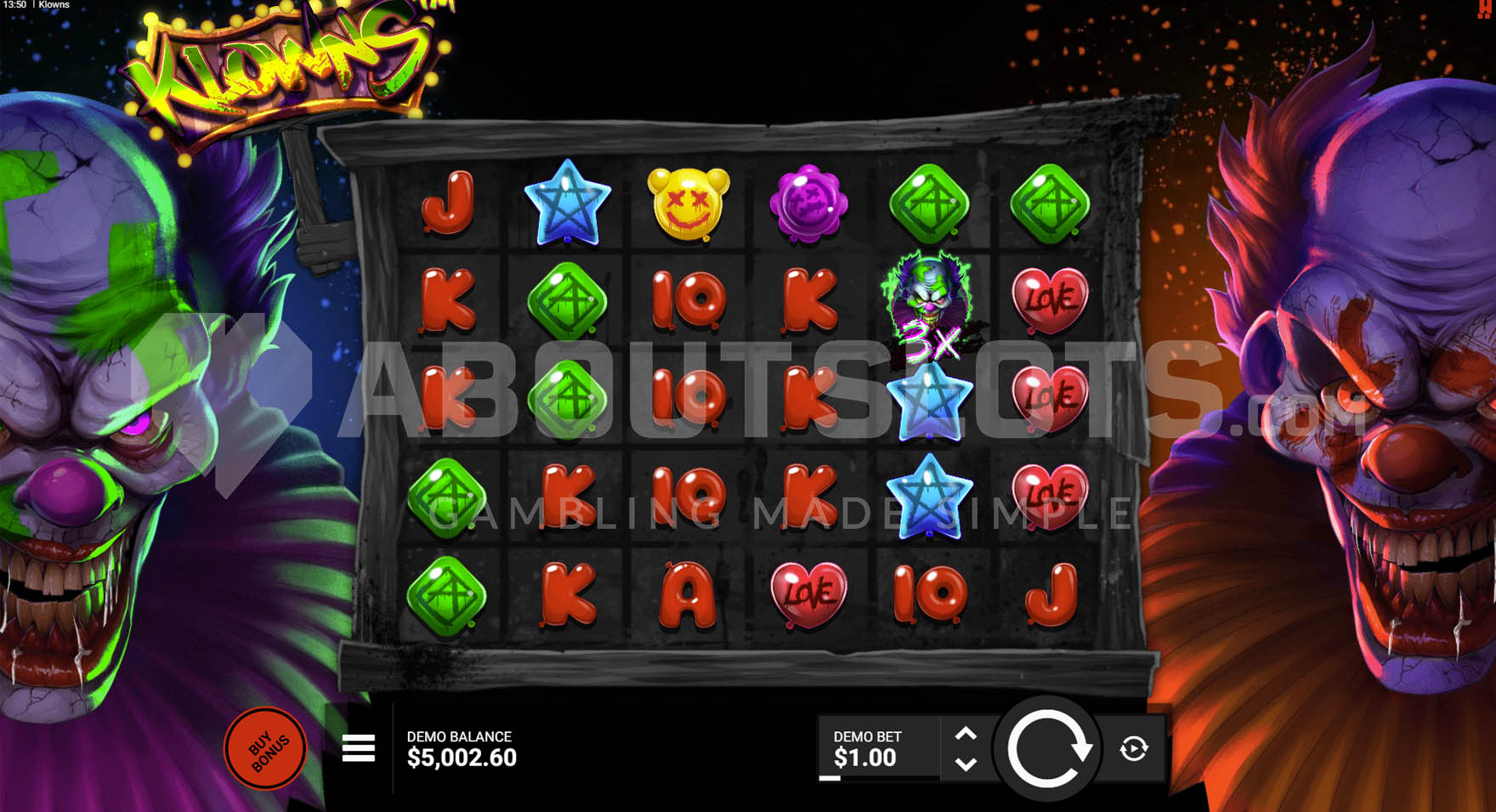 Base game view of Klowns slot, showing two horror clowns flanking the grid with various symbols on the reels.