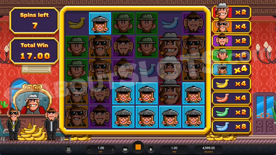 Winning combination of 8 blue monkey symbols during free spins in Banana Town Dream Drop.