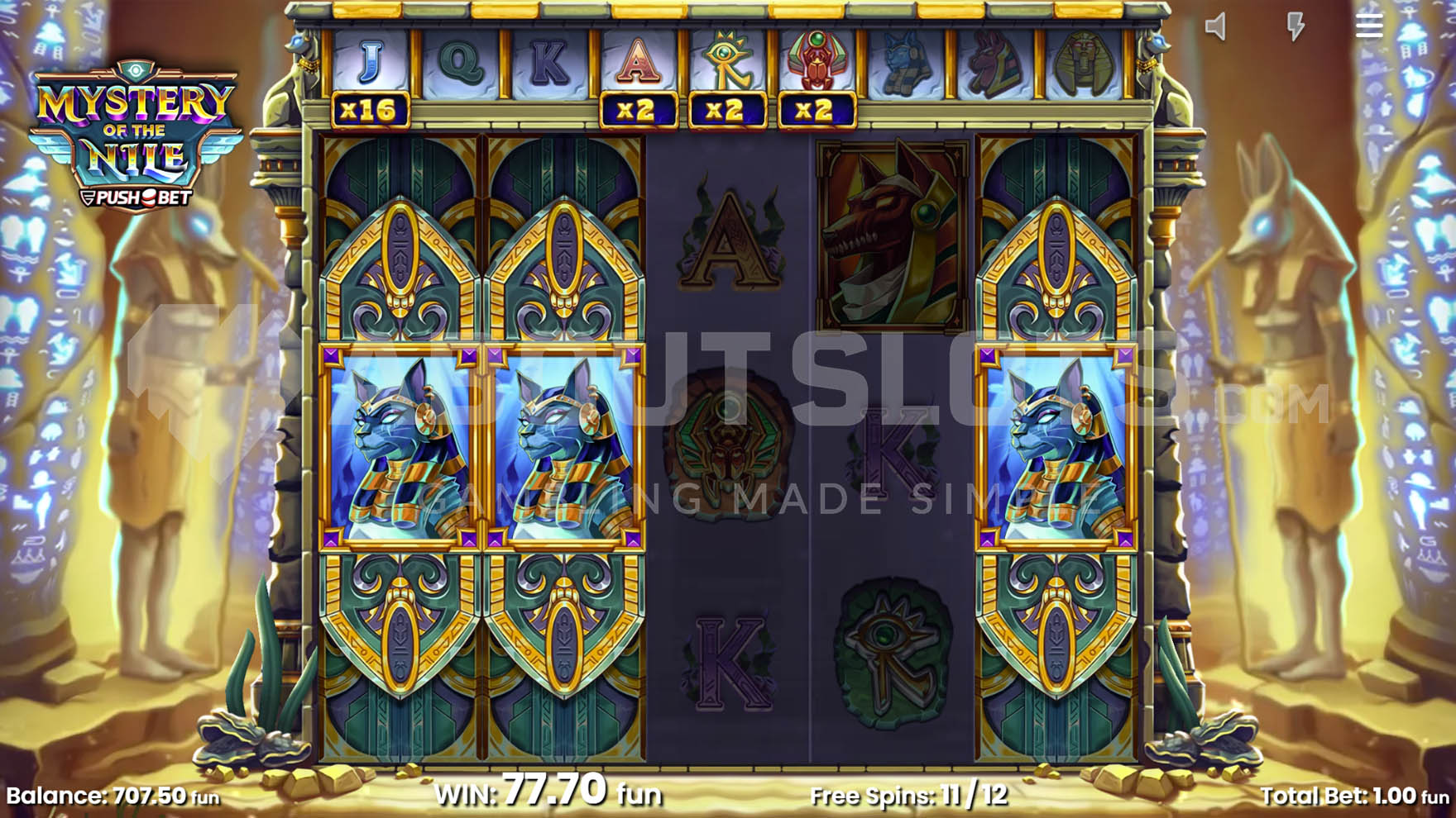 Free Spins in progress with 3 Mystery Stacks on reels 1, 2 and 5, along with several symbols with active multipliers.